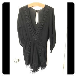 Black romper with crochet detail